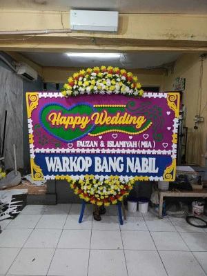 Papan Bunga di Muncul
